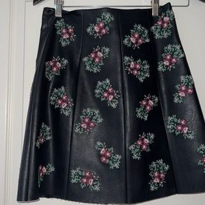 Mini floral leather skirt